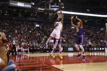 Toronto Raptors Kawhi Leonard SF (2) goes under for two of this game leading 45 points on the game during the second half in Toronto, Ont. on Wednesday January 2, 2019. Jack Boland/Toronto Sun/Postmedia Network