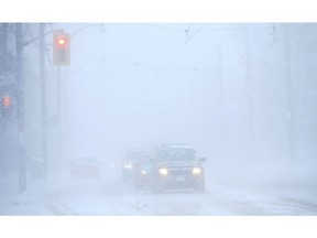 White-out conditions on Bathurst St. south of Dupont as the first major snowfall of the year to hit Toronto January 28, 2019. Jack Boland/Toronto Sun