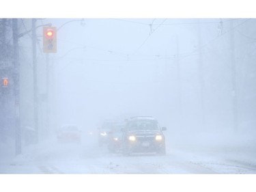 White-out conditions on Bathurst St. south of Dupont as the first major snowfall of the year to hit Toronto. Environment Canada called it "hazardous winter conditions" with snowfall up to 25 centimetres. Temps midday were were -7 C at 4 p.m. but 65 kmh winds made it feel like -18C on Monday January 28, 2019. Jack Boland/Toronto Sun/Postmedia Network