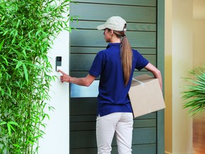 A smart video doorbell allows homeowners to monitor deliveries.