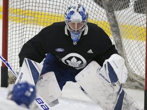 Maple Leafs goaltender Frederik Andersen G  sets on a shot from teammate Connor Brown during practice at MasterCard Centre in Toronto yesterday. (Jack Boland/Toronto Sun)