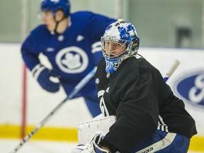 Injured Maple Leafs goalie Frederik Andersen takes part in team practice at the MasterCard Centre on Friday.