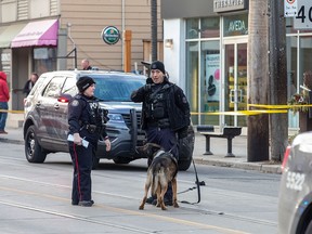 Police secure the scene of a brazen daylight shooting in the Beaches in Toronto, Ont. on Sunday, Jan. 6 2019. John Hanley photo