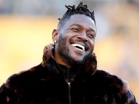 Pittsburgh Steelers wide receiver Antonio Brown stands along the sideline in street clothes before an NFL football game against the Cincinnati Bengals, Sunday, Dec. 30, 2018, in Pittsburgh.
