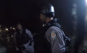 People dressed in gear emulating Toronto Police in a video posted to YouTube Jan. 4, 2019.