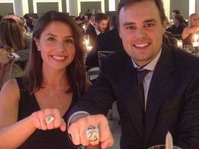 Cameron Gaunce and his wife with their 2017 Stanley Cup rings.