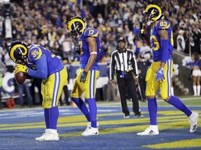 Rams running back C.J. Anderson celebrates after scoring against the Cowboys during the first half of an NFL divisional playoff game in Los Angeles on Jan. 12, 2019.