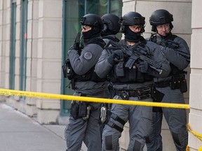 Toronto Police are pictured after Sunday's shooting in the Beaches. (John Hanley photo)