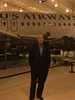 Dave Sanderson stands in front of plane from US Airways Flight 1549.
