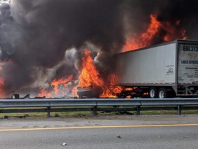 Flames engulf vehicles after a fiery crash along Interstate 75, Thursday, Jan. 3, 2019, about a mile south of Alachua, near Gainesville, Fla. Highway officials say at least six people have died after a crash and diesel fuel spill sparked a massive fire along the Florida interstate. (WGFL-Gainesville via AP)