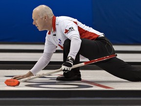 Skip Glenn Howard, playing with son Scott at third, second David Mathers and lead Tim March, scored the winning point with hammer in the 10th versus Rob Retchless to go to 5-1 at the Woolwich Memorial Centre. (POSTMEDIA NETWORK FILES)