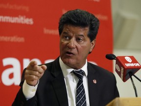 Unifor National President Jerry Dias addresses the media, Tuesday, Jan. 8, 2019, in Windsor, Ont.  (AP Photo/Carlos Osorio)