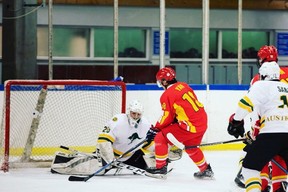 Team China’s Eddie Yan carries the puck during a game against Australia at the under-20 Division III world championship in Iceland earlier this month. Yan and childhood friend Sean Wu moved from Beijing to Toronto as kids to chase their hockey dreams. (SUBMITTED PHOTO)