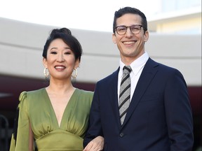 Sandra Oh and Andy Samberg, hosts of the 76th Annual Golden Globe Awards, pose after rolling out the red carpet during a preview day at The Beverly Hilton Hotel on January 3, 2019 in Beverly Hills, Calif. (Kevork Djansezian/Getty Images)