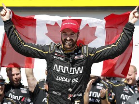 James Hinchcliffe celebrates after winning an IndyCar Series race Sunday, July 8, 2018, at Iowa Speedway in Newton, Iowa. (AP Photo/Charlie Neibergall)