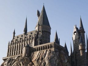 Guests experience the magnificence of Hogwarts castle as it towers above Hogsmeade at The Wizarding World of Harry Potter, at Universal Orlando Resort. (Supplied)