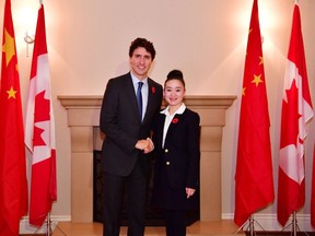 Prime Minister Justin Trudeau, left, and Karen Wang