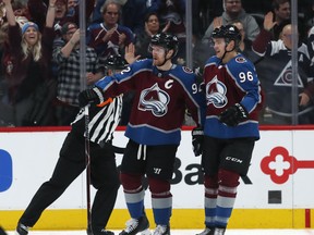 Thanks to Nathan MacKinnon, Colorado Avalanche wingers Gabriel Landeskog (left) and Mikko Rantanen (right) have become high-end fantasy fixtures so far this season. (AP Photo/David Zalubowski)