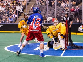Adam Jones of the Toronto Rock takes a shot during the game against the Georgia Swarm on Friday. RYAN McCULLOUGH PHOTO