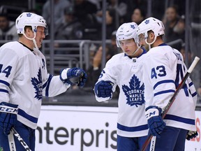 Toronto players celebrate a power-play goal against the Los Angeles Kings on Nov.  13. The Maple Leafs have had just 121 power plays through 48 games, the least in the NHL. (Harry How/Getty Images)