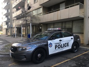 Toronto Police guard the scene of a suspected murder-suicide at 544 Birchmount Rd. on Tuesday, Jan. 8, 2019, one day after a man, 40, was found dead on the ground near the building's main entrance and a woman, 30, was found dead inside an eighth-floor apartment. (Chris Doucette/Toronto Sun/Postmedia Network)