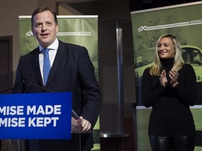 Jeff Yurek, right,, Minister of Transportation, and Kinga Surma, Parliamentary Assistant to the Minister of Transportation make an announcement at a railway station in St. Catherines, Ont., on Friday, December 14, 2018.  THE CANADIAN PRESS/Nathan Denette