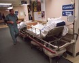 Patients wait in the hallway at the overcrowded Queensway-Carleton Hospital in Ottawa in 2016. (Errol McGihon/Postmedia)