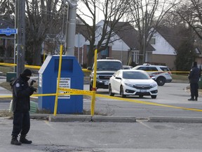 Toronto Police gather evidence at Elmhurst and Redwater Drs. on Thursday, Jan. 10, 2019  the morning after a man, 18, was gunned down in Rexdale. (Chris Doucette/Toronto Sun)