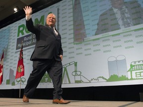 Ontario Premier Doug Ford waves as he departs after speaking at the Rural Ontario Municipal Association conference in Toronto on Monday January 28, 2019. THE CANADIAN PRESS/Frank Gunn