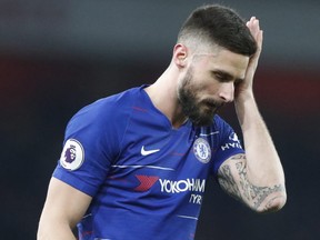 Chelsea's Olivier Giroud wipes his face after the end of the English Premier League soccer match between Arsenal and Chelsea at the Emirates stadium in London on Jan. 19, 2019. Arsenal won the game 2-0.(FRANK AUGSTEIN/AP)