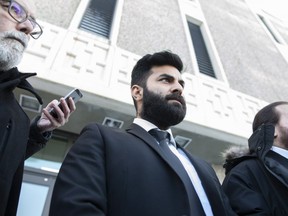 Jaskirat Singh Sidhu leaves provincial court in Melfort, Sask., Tuesday, January, 8, 2019. Sidhu, the driver of a transport truck involved in a deadly crash with the Humboldt Broncos junior hockey team's bus, has pleaded guilty to all charges against him. THE CANADIAN PRESS/Kayle Neis