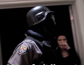 People dressed in gear emulating Toronto Police enter a home on in a video posted to YouTube Jan. 4, 2019.