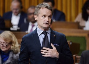 Minister of Veterans Affairs Seamus O’Regan rises during question period in the House of Commons on Parliament Hill in Ottawa on Thursday, Sept. 27, 2018. The federal government says it shortchanged hundreds of thousands of veterans and their survivors over seven years, and is preparing to compensate them a total of $165 million. (THE CANADIAN PRESS/Adrian Wyld)
