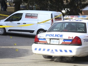 A Toronto Police cruiser sits in a parking lot across from a building on Dundalk Dr. In Scarborough. Toronto's fourth homicide of the year occurred inside an eighth-floor unit at the Kennedy Place high rise at 100 Dundalk Dr., southwest of Hwy. 401 and Kennedy Rd. in Scarborough. A 37-year old man was shot to death around 11:50 p.m. Friday on Saturday January 12, 2019. Jack Boland/Toronto Sun/Postmedia Network)