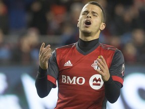 Toronto FC's Sebastian Giovinco reacts after missing a scoring opportunity during CONCACAF Champions League Round of 16 action against the Colorado Rapids in Toronto on Tuesday, February 27, 2018. (THE CANADIAN PRESS/Chris Young)