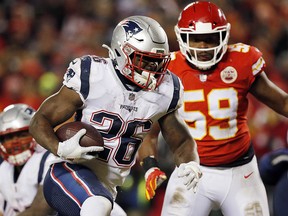 Sony Michel of the New England Patriots runs with the ball against the Kansas City Chiefs during the AFC Championship game at Arrowhead Stadium on January 20, 2019 in Kansas City. (David Eulitt/Getty Images)