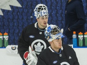 Toronto Maple Leafs goalies Frederik Andersen (front) and  Michael Hutchinson during practice at the MasterCard Centre in Toronto on Jan. 9, 2019. (ERNEST DOROSZUK/Toronto Sun)