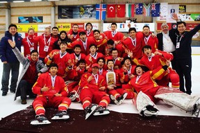 Team China celebrates its IIHF under-20 Division III world championship gold-medal victory. The team features a pair of Beijing-born childhood friends – Eddie Yan and Sean Wu – who moved to Toronto to follow their hockey dreams. (SUBMITTED PHOTO)