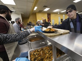 Duke enjoys a warm meal out of the cold at The Good Shepherd on January 17, 2019. Stan Behal/Toronto Sun