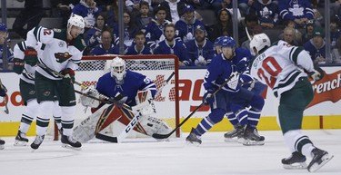 Minnesota Wild Ryan Suter D (20) takes point shot at Toronto Maple Leafs Michael Hutchinson G (30) during first period in Toronto on Thursday January 3, 2019. Jack Boland/Toronto Sun/Postmedia Network