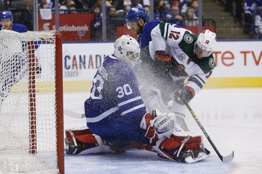 Minnesota Wild Eric Staal C (12) scores on Toronto Maple Leafs Michael Hutchinson G (30) during second period in Toronto on Thursday January 3, 2019. Jack Boland/Toronto Sun/Postmedia Network