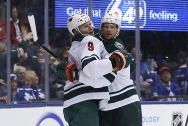 Minnesota Wild Eric Staal C (12) celebrates his goal with teammate  Mikko Koivu C (9) during second period in Toronto on Thursday January 3, 2019. Jack Boland/Toronto Sun/Postmedia Network