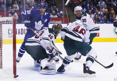 Minnesota Wild Devan Dubnyk G (40) and Toronto Maple Leafs John Tavares C (91) watch the puck slide past the post in the last minute of the third period in Toronto on Thursday January 3, 2019. Jack Boland/Toronto Sun/Postmedia Network