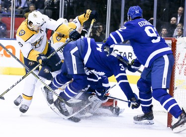 Toronto Maple Leafs center Auston Matthews (34) falls into the Leafs net in Toronto on Monday January 7, 2019. The Nashville Predators defeated the Toronto Maple Leafs, 4-0. Veronica Henri/Toronto Sun/Postmedia Network