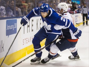 Toronto Maple Leafs Par Lindholm  during 1st period action against the Washington Capitals Dmitry Orlov at the Scotiabank Arena in Toronto on Wednesday January 23, 2019. Ernest Doroszuk/Toronto Sun/Postmedia