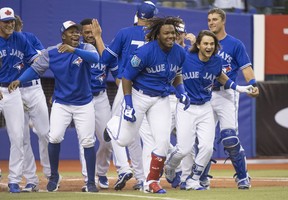 Blue Jays’ prospect Vladimir Guerrero Jr. celebrates his walk-off homerun last March during a pre-season game in Montreal. (CP FILES)