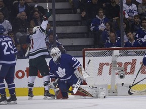 The Wild score their first goal on Maple Leafs netminder Michael Hutchinson during the first period on Thursday at Scotiabank Arena. Minnesota won 4-3. (Jack Boland/Toronto Sun)