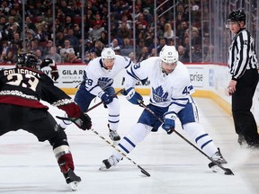 Nazem Kadri of the Toronto Maple Leafs skates with the puck against Alex Goligoski #33 of the Arizona Coyotes during the third period of the NHL game at Gila River Arena on February 16, 2019 in Glendale, Arizona. The Coyotes defeated the Maple Leafs 2-0.