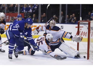 Toronto Maple Leafs Patrick Marleau C (12) beats Edmonton Oilers Mikko Koskinen G (19) during the first period in Toronto on Wednesday February 27, 2019. Jack Boland/Toronto Sun/Postmedia Network
