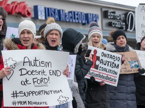 Parents protest outside MPP Lisa MacLeod's constituency office in Barrhaven claiming that the recent funding announcement for autistic children is not nearly enough on Feb. 8, 2019. (Wayne Cuddington/ Postmedia)